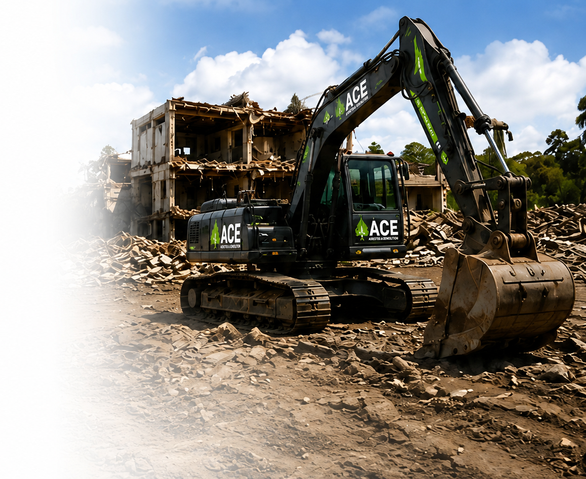 Ace Asbestos & Demolition excavator clearing a demolition site
